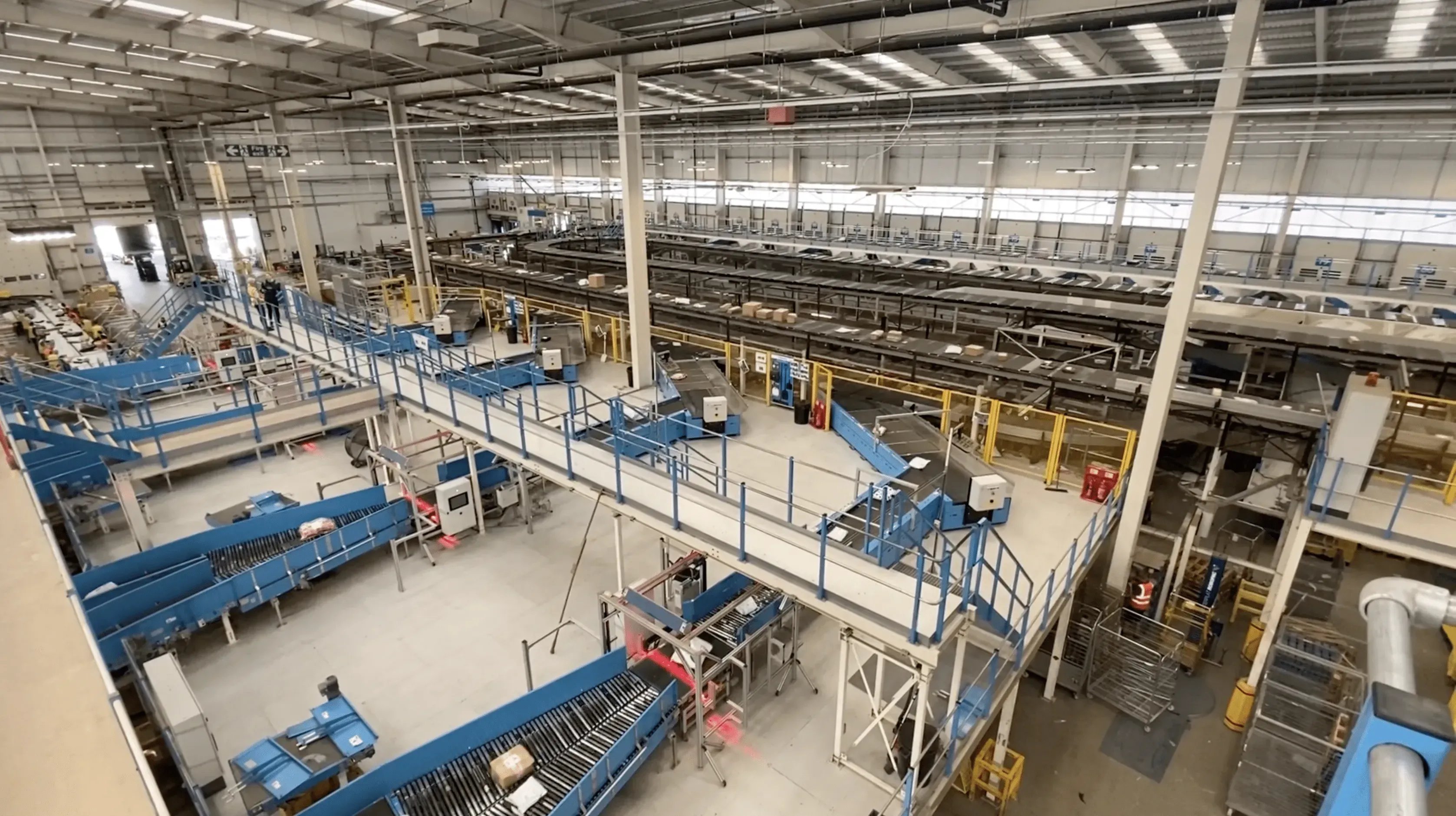 Smart conveyor technology in a manufacturing facility using sensors and data analytics to improve operational intelligence and production efficiency